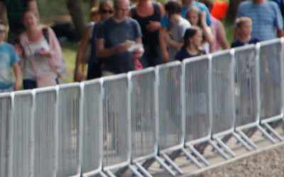 Crowd-control barriers installed for an outdoor event queue line.